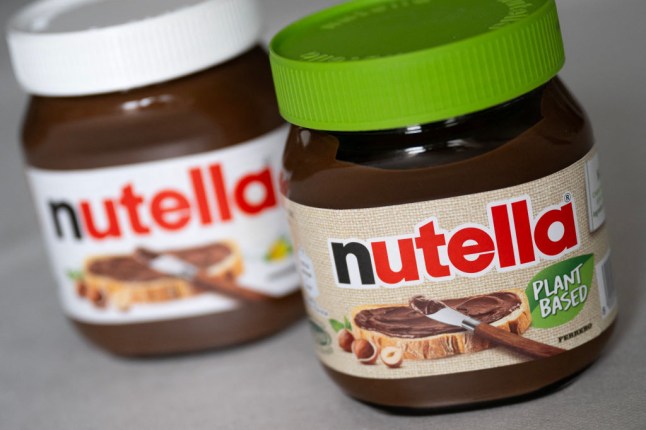 A jar of regular Nutella and plant-based Nutella