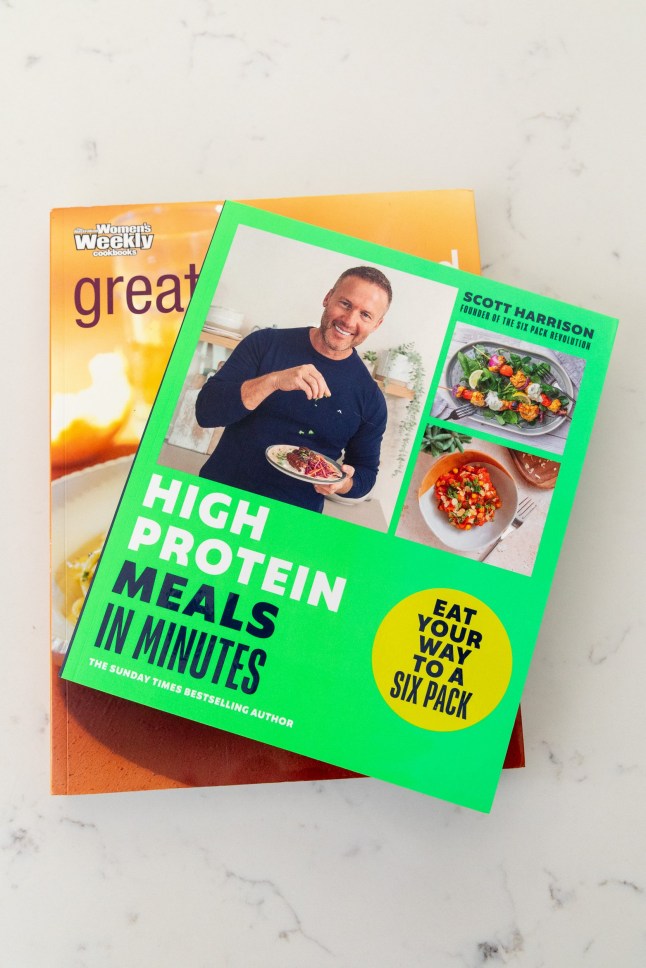 Metro - What's Cooking? Scott Harrison. Picture shows one of Scott's cookbooks and an Australian Womans Weekly Cookbook. One of his favourite recipes is in one of the Australian Womans Weekly Cookbooks. 12th May 2025. PHOTOGRAPH BY DANIEL JONES 2025 +44 (0)7815 853503 info@danieljonesphotography.co.uk www.danieljonesphotography.co.uk